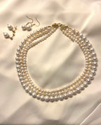 Triple pearl necklace